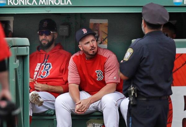 Boston Red Sox pitcher David Price, left, sits with relief pitcher Austin Maddox in the bullpen during the sixth inning of a ba<em></em>seball game against the Oakland Athletics at Fenway Park in Boston, Thursday, Sept. 14, 2017. Price was activated from the disabled list prior to the game and expected to work as a relief pitcher. (AP Photo/Charles Krupa)