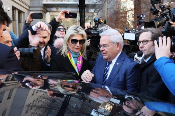 Senator Bob Menendez (D-NJ) and his wife Nadine Menendez depart a Manhattan court following an arraignment on new charges in the federal bribery case against them on March 11, 2024 in New York City.