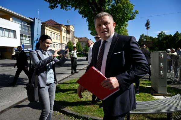 Slovakia's Prime Minister Robert Fico arrives for a cabinet's away-from-home session in the town of Handlova, Slovakia, Wednesday, May, 15, 2024. Prime Minister Robert Fico was shot and injured after the away-from-home government meeting in Handlova, according to information co<em></em>nfirmed by Parliamentary Vice-Chair Lubos Blaha, who suspended the House session. (Radovan Stoklasa/TASR via AP)