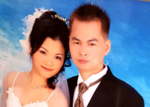 Shooting victim Zhiwen Yan is pictured with his wife, Eva Zhao, in a wedding photo.