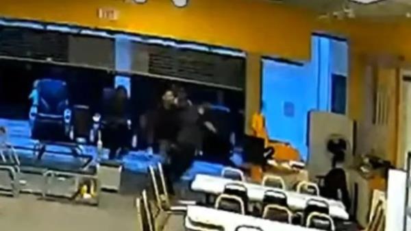 This f<em></em>rame from surveillance footage shows an assault that happened at a carnival at the Exton Square Mall in Exton, PA on Saturday night, police say. (West Whiteland Police Department)