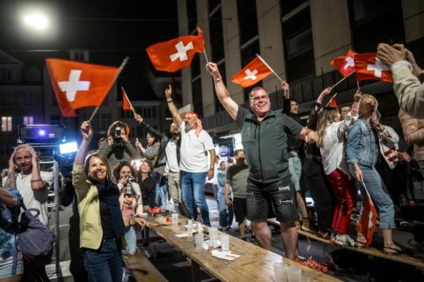 Supporters react during a public watching on May 12, 2024 in Biel after Swiss singer Nemo who represented Switzerland with the song "The Code" won the final of the 68th Eurovision Song Co<em></em>ntest (ESC) 2024. Nemo Mettler was born in the city. (Fabrice Coffrini/AFP via Getty Images)