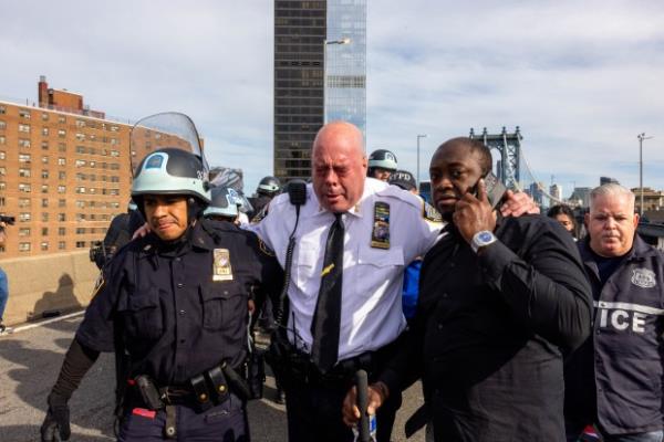 Police cuff numerous pro-Palestine protesters on Manhattan Bridge