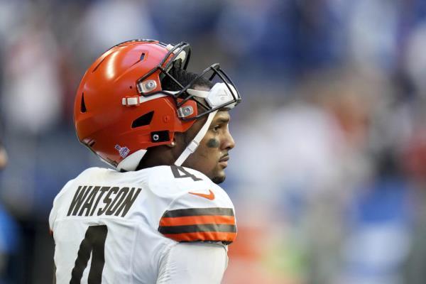 Cleveland Browns quarterback Deshaun Watson walks on the field before an NFL football game against the Indianapolis Colts, Sunday, Oct. 22, 2023, in Indianapolis. (AP Photo/Michael Conroy)