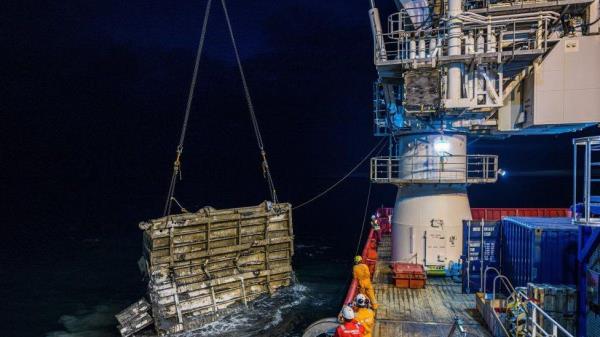 The bow ramp from the wreck 'Estonia' is being salvaged during a survey operation by the ship 'Viking Reach', on the shipwreck's site in the Baltic Sea, 25 July 2023