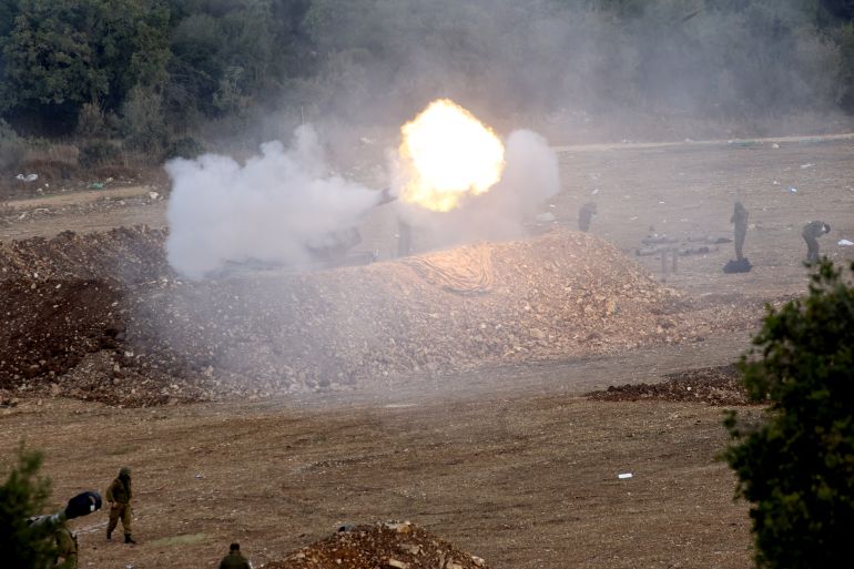 Israeli forces launch artillery fire towards southern Lebanon from the border zone in northern Israel