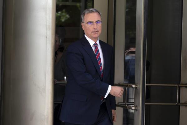 Pat Cipollone, former White House counsel under President Do<em></em>nald Trump, leaves the federal courthouse in Washington, Friday, Sept. 2, 2022. 