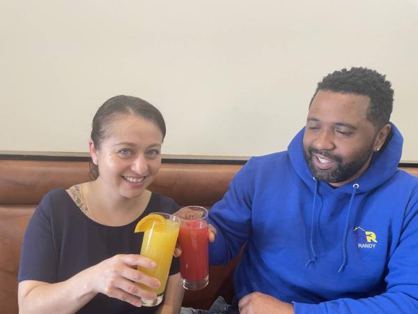 Diners Ana Tovar, left, and Marcus St. Charles offer cheers Sunday before trying some mimosas in South Holland.