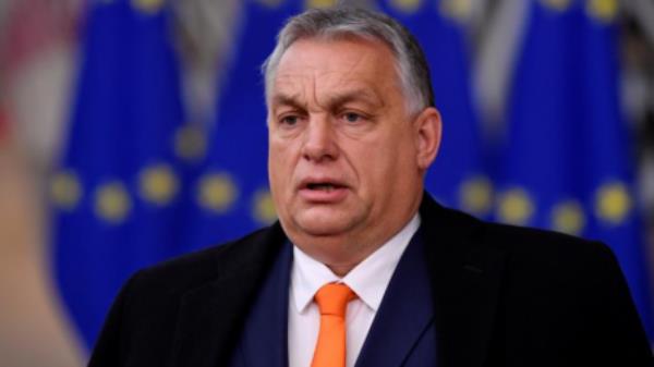 FILE PHOTO: Hungary's Prime Minister Viktor Orban speaks as he arrives to attend a face-to-face EU summit amid the coro<em></em>navirus disease (Covid-19) lockdown in Brussels, Belgium December 10, 2020. John Thys/Pool via REUTERS