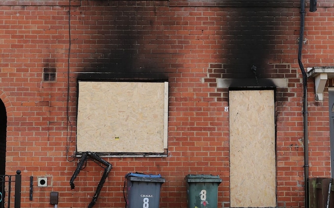 The house in Bradford was left a burnt-out shell after the fatal blaze