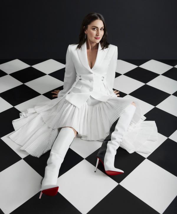 Sarah Bareilles wearing “Camden” jacket and “Layla” skirt, both price upon request</p>

<p>　　at Adeam.com; “Astrilarge Botta” boots, $1,995 at US.ChristianLouboutin.com;</p>

<p>　　“Slim Tire” earrings, $290 at NickhoRey.com