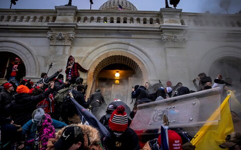 Demo<em></em>nstrators breached security and entered the Capitol as Co<em></em>ngress debated the 2020 presidential election Electoral Vote Certification