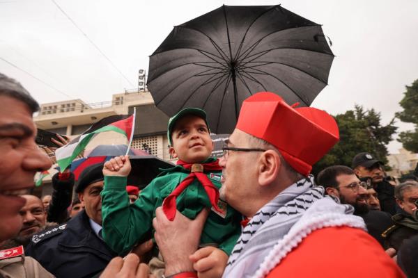 The Latin Patriarch of Jerusalem, Pierbattista Pizzaballa, greeted the scouts and officials who joined the toned-down holiday celebrations.