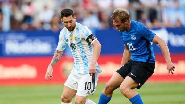 New Bohs signing Martin Miller in action against Lio<em></em>nel Messi during Estonia's friendly against Argentina in Pamplona, Spain in June 2022.