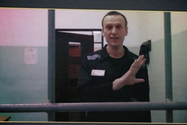  Russian opposition leader Alexei Navalny, seen on a TV screen as he appears in a video l<em></em>ink provided by the Russian Federal Penitentiary Service from the co<em></em>lony in Melekhovo, Vladimir region, during a hearing at the Russian Supreme Court in Moscow, Russia, on Wednesday, Aug. 23, 2023. 