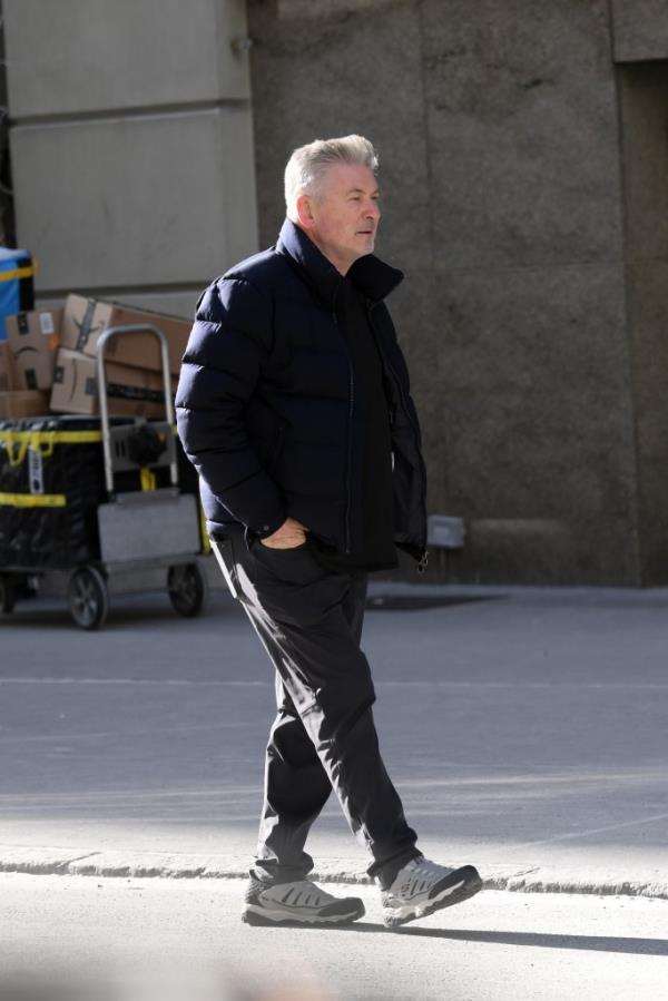 Alec Baldwin walking on a New York City street.