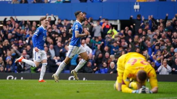 Everton's Dwight McNeil (right) celebrates scoring their side's second goal of the game during the Premier League match at Goodison Park, Liverpool. Picture date: Sunday April 21, 2024. PA Photo. See PA story SOCCER Everton. Photo credit should read: Peter Byrne/PA Wire...RESTRICTIONS: EDITORIAL USE o<em></em>nLY No use with unauthorised audio, video, data, fixture lists, club/league logos or 