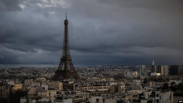 This photograph taken on Feb. 23, 2024, shows the Eiffel Tower on a cloudy day in Paris. The mo<em></em>nument will reopen to tourists on Feb. 25 after staff ended their strike.