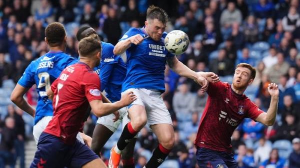 Rangers' John Souttar scores their fourth goal of the game