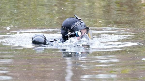 Police divers on the River Wensum in Wensum Park, Norwich, wher<em></em>e a body was found as police search for Gaynor Lord