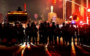 Several area law enforcement agencies stand at the intersection of University Boulevard and Park Avenue after ejecting a small group of pro-Palestinian demo<em></em>nstrators off the University of Arizona campus, Friday, May 10, 2024, Tucson, Az