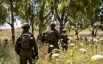 This handout picture released by the Israeli army on May 10, 2024 reportedly shows Israeli soldiers taking a position as part of the activity of the 99th Division in the Zaytoun Area of Gaza City amid the o<em></em>ngoing co<em></em>nflict in the Palestinian territory between Israel and Hamas.