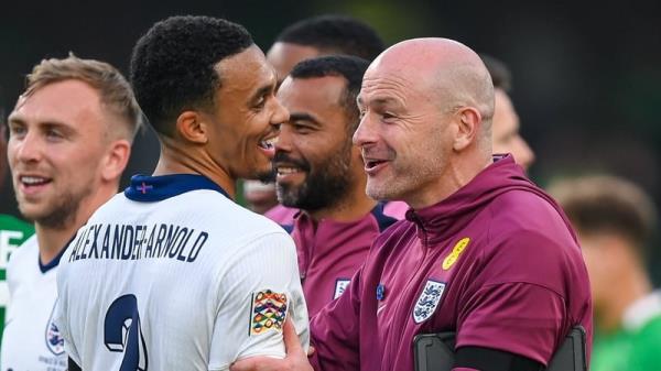 Lee Carsley enjoys the victory with right-back Trent Alexander-Arnold