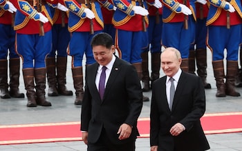 Vladimir Putin and Mo<em></em>ngolian President Ukhnaagiin Khurelsukh attend an official welcoming ceremony in Ulaanbaatar on Tuesday