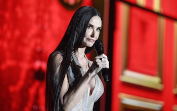 Demi Moore, the actress, also had a trouble co<em></em>ntaining the noisy crowd at the gala