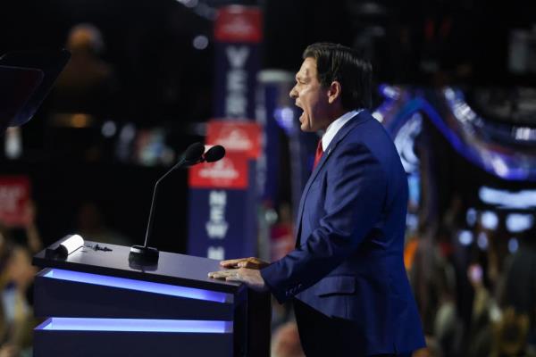 Ron DeSantis speaks on stage at RNC.