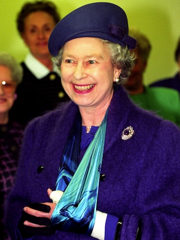 The late Queen, pictured with her arm in a sling havin<em></em>g suffered a riding injury to her wrist