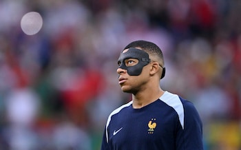 Mbappe wearing a protective face mask as a result of breaking his nose