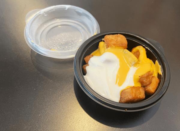 a bowl of taco bell cheesy fiesta potatoes 