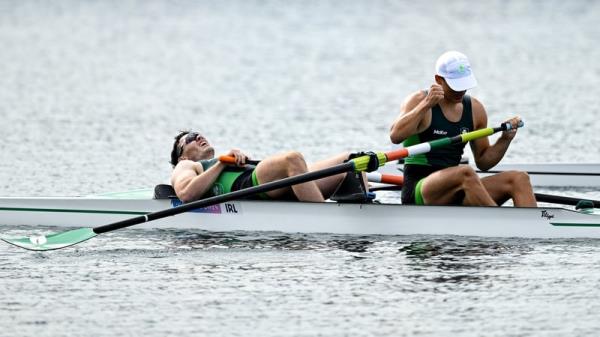 Ross Corrigan (l) and Nathan Timo<em></em>ney after they crossed the line in the semi-final