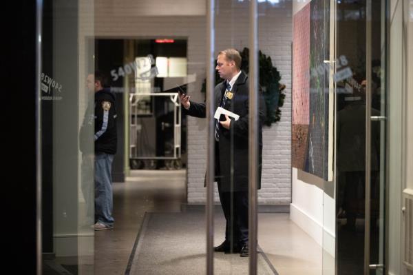 police officer in lobby of building