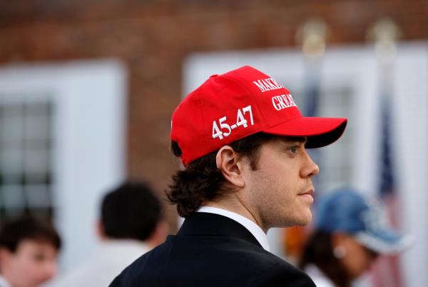 A guest wears a Trump campaign hat at the Trump Natio<em></em>nal Golf Club ahead of a speech by former U.S. President Do<em></em>nald Trump.