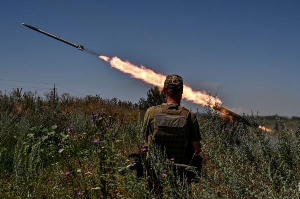 Ukrainian servicemen fire a missile towards Russian troops near Zaporizhzhia on July 13, 2023.