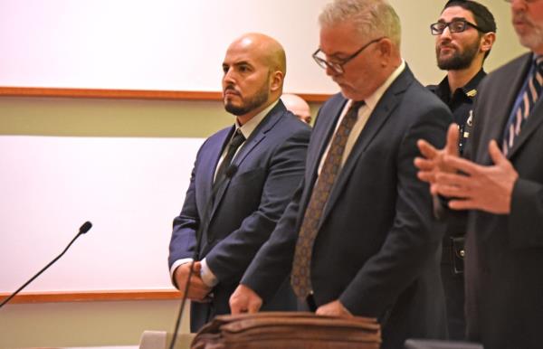 1/23/24  NYPD officer Eric Duran (pictured, with beard) was arraigned in Bronx Criminal Court for murder.  He is accused of throwing a full beverage cooler at a man named Eric Duprey, who was trying to flee from the officer during a drug bust on Aqueduct Avenue near West 190th Street. 