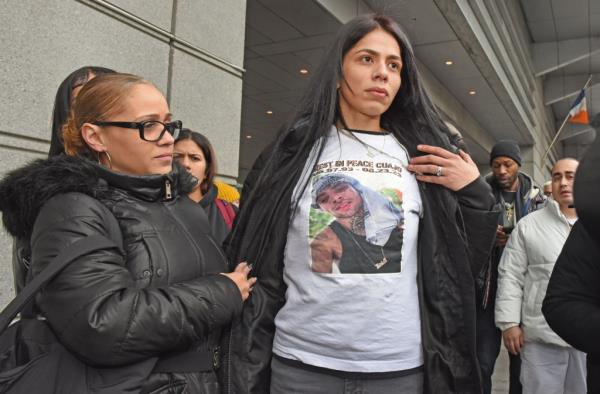 Orlyanis Velez, center, wife of Eric Duprey, is seen outside Bronx Court.