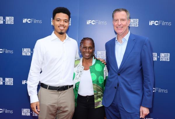 The couple share two children, including Dante, pictured last week with his parents at the IFC Center.