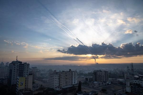 Rockets are fired toward Israel from Gaza, Saturday, Oct. 7, 2023. 