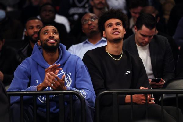 Cam Johnson (right) with his Nets teammate and good friend Mikal Bridges after the two were part of the trade with the Suns for Kevin Durant last season.