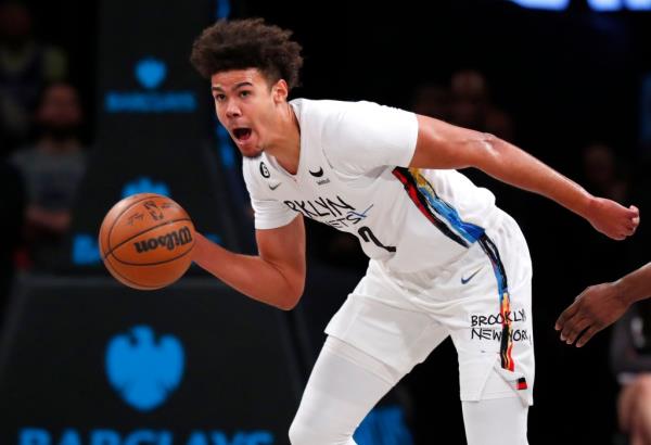 Cam Johnson is glad his co<em></em>ntract situation is settled and that he is back with the Nets.