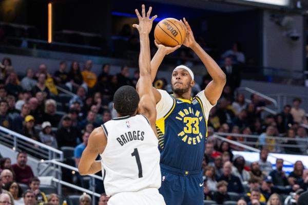 Mikal Bridges defends Myles Turner during the Nets' loss to the Pacers.