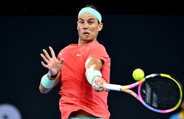 Rafael Nadal of Spain plays a forehand in his match against Dominic Thiem of Austria.