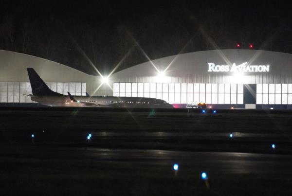 An iAero Airways flight that was carrying immigrants from the Mexican border on the tarmac at Westchester County Airport in White Plains, NY on April 22, 2022.