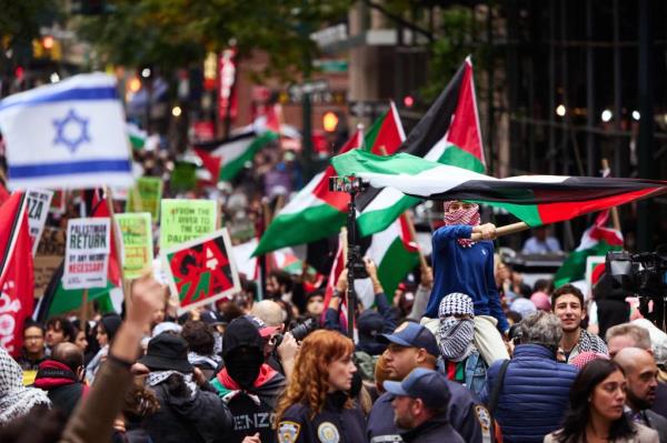 Pro-Palestinian protestors march during a rally on Mo<em></em>nday following attacks by Hamas terrorist on Israel over the weekend.