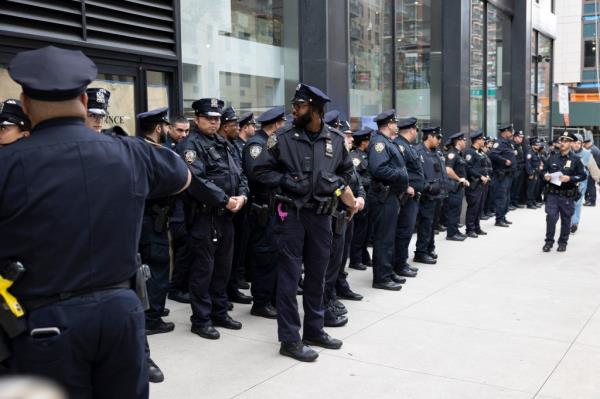 Back on the home front, the NYPD ordered all cops to report in uniform on Friday and heightened security at all police precincts. 