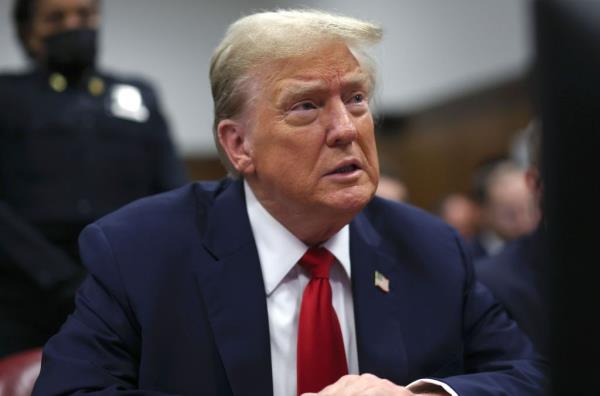 Former US President Do<em></em>nald Trump in a suit and tie, attending his trial at the Supreme Court of the State of New York, 16 May 2024