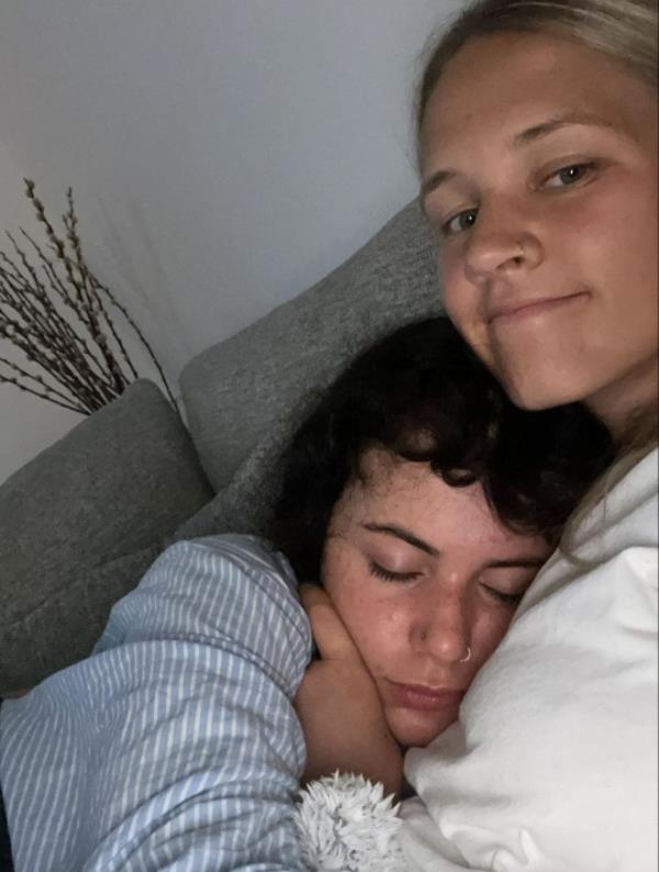 BELLA ANDREOU, 24, ASLEEP ON FIANCE MEG STONE, 25